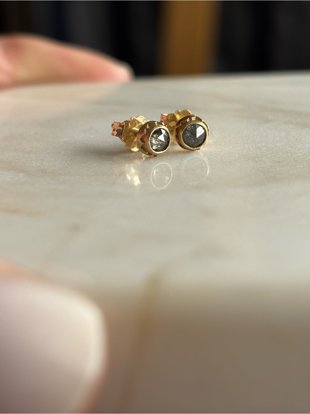 3mm salt and pepper rose cut diamond studs set in 14k yellow gold mountain bezel